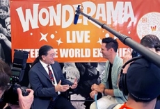 Director being interviewed by David Osmond of Wonderama in Times Square, New York City, New York