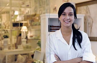 Small Business Owner: Proud Woman And Her Store