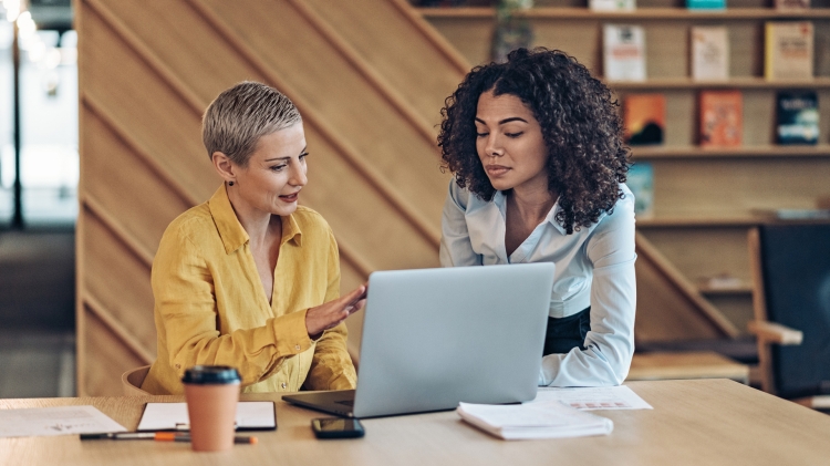 Two businesswomen talking