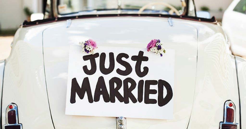 Just Married sign on a car from the Department of Education