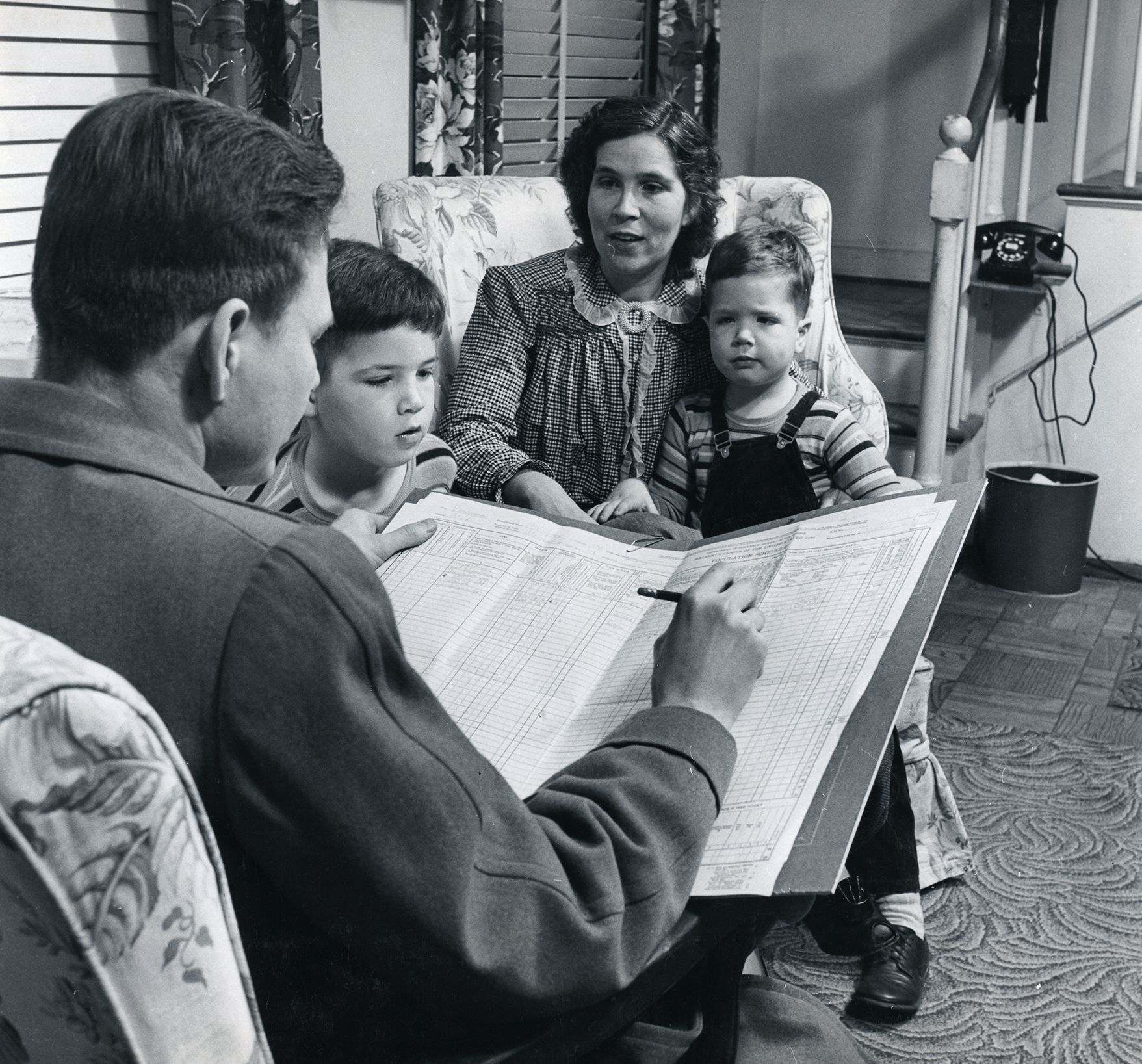 1950 Census Records Release: A family completes their Census form.