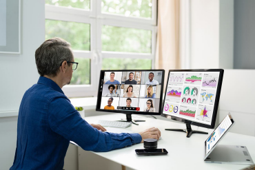 Person working with data in a virtual meeting