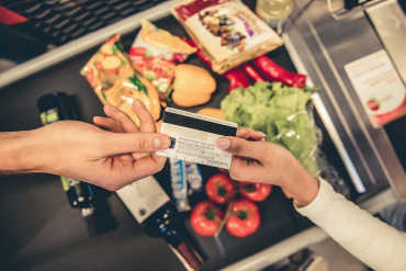 Person paying for groceries